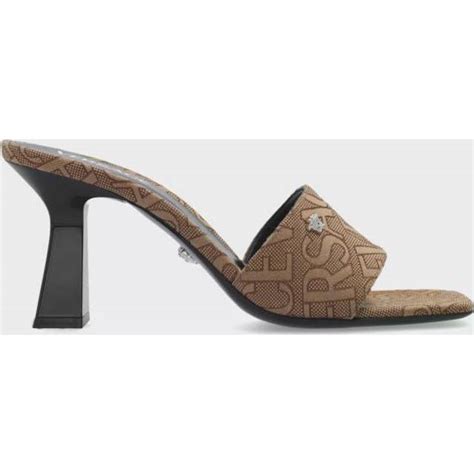 Versace Allover mules in brown 